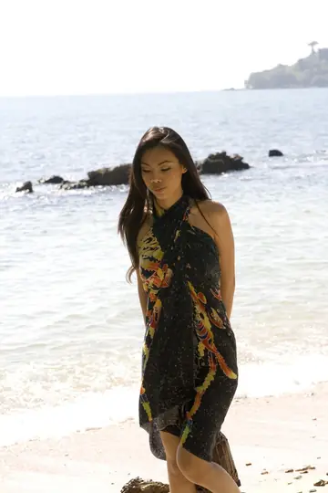 Asian Brunette with Big Tits Exposes Her Breasts in a Dress Outdoors