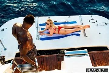 Brandi Love – Tattooed Blonde MILF Takes Interracial Anal on a Boat