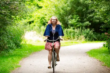 Poppy C – Busty Blonde BBW Sheds Her Blouse and Skirt Outdoors