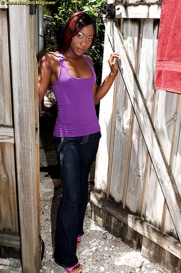 Giselle Capri – Ebony Brunette in Jeans and Heels Spreads Outdoors
