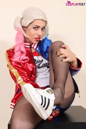 Woman in Pantyhose and Shorts Spreads and Shows Her Feet
