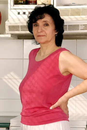 Mature Chubby Brunette Spreads Her Hairy Pussy in the Kitchen