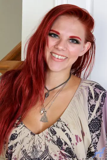 Redhead MILF Removes Her Panties and Spreads Her Tattooed Pussy