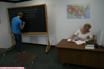 Tall Mature Blonde in Glasses Gives a Handjob