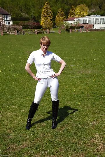 Mature Redhead in Boots Spreads Her Hairy Pussy Outdoors