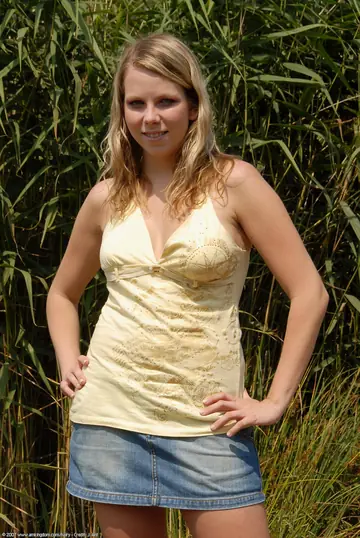 Blonde Babe Undresses Outdoors and Spreads Her Hairy Pussy