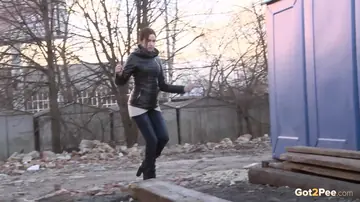 European Woman Pulls Jeans Aside and Spreads Her Hairy Pussy Outdoors