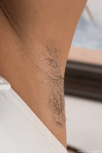 Ebony Woman Poses Nude and Shows Hairy Armpits