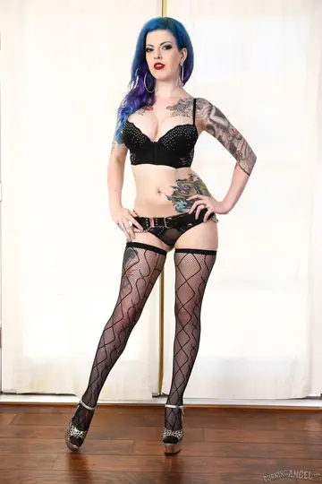 Penny Poison – Redhead with Big Tits Spreads in Stockings and Glasses