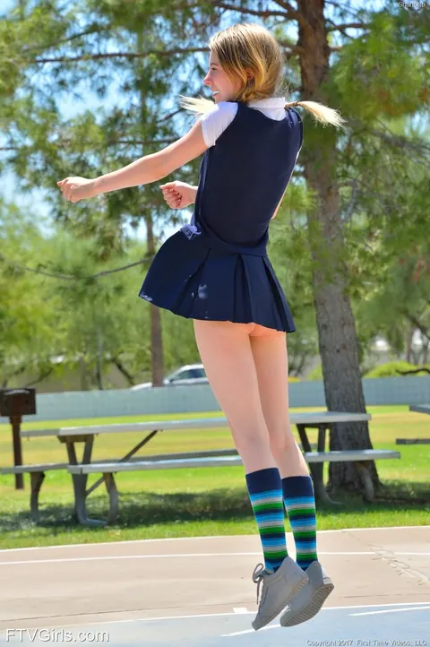 Charlotte Carmen: Petite Blonde in a Uniform Strips and Spreads Outdoors – photo 2 of 20