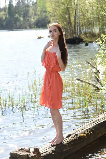 Slim Woman Strips Out of Her Dress Outdoors Showing Her Small Tits