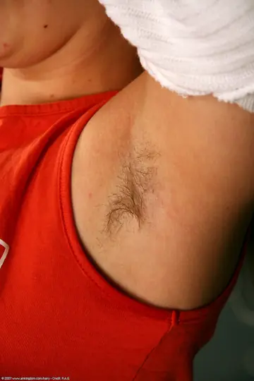 Busty Blonde Spreads Her Hairy Pussy Wide for the Camera