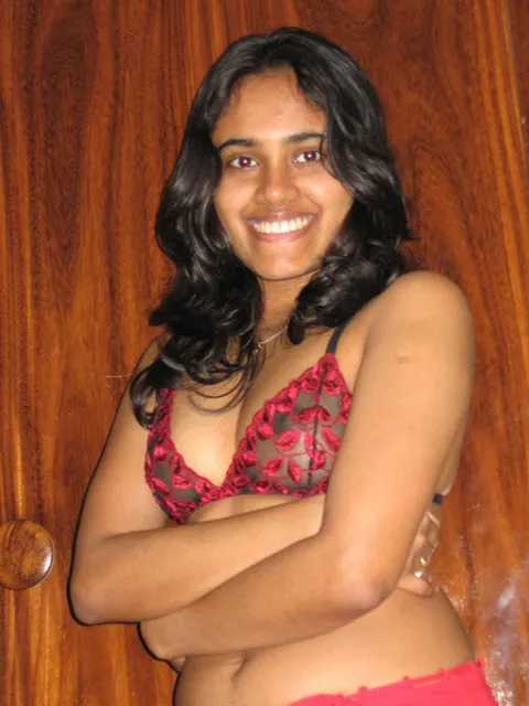 Indian Woman Shows Her Breasts in Lingerie and Skirt on the Bed – photo 5 of 10