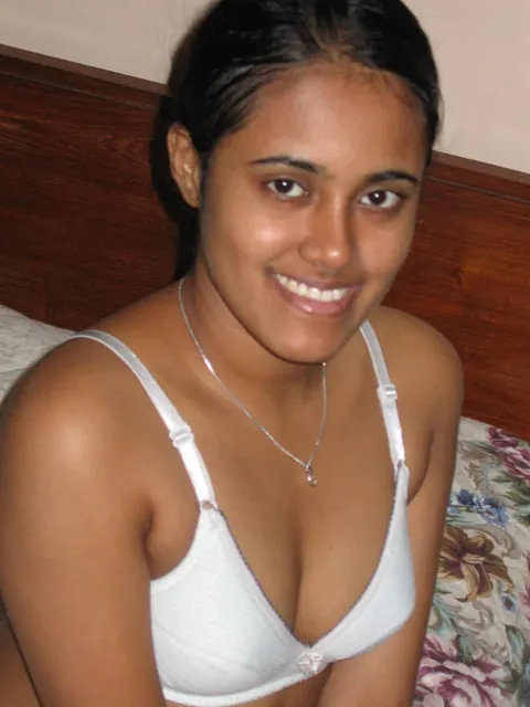 Indian Woman Shows Her Breasts in Lingerie and Skirt on the Bed – photo 9 of 10