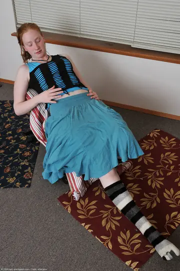 Petite Redhead with Short Hair Spreads Her Pussy in Socks