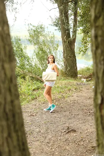 European Babe Undresses and Uses a Dildo in the Forest