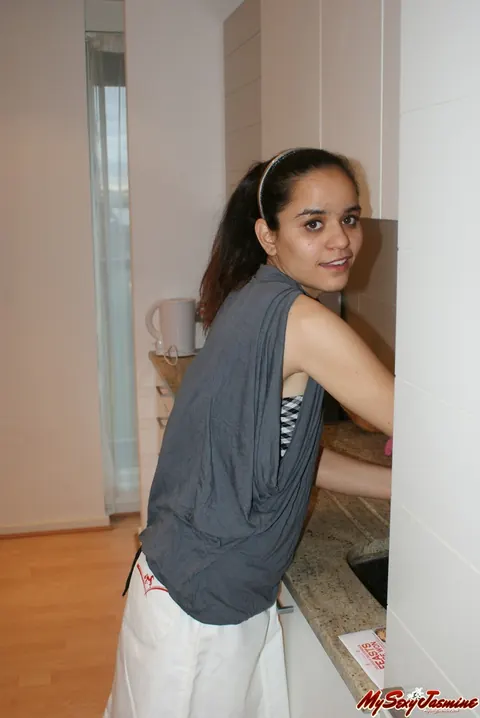 Jasmine Mathur: Indian Brunette Unleashes Her Small Natural Tits in the Kitchen – photo 1 of 12