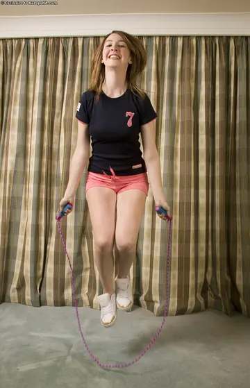 Busty Brunette Strips Out of Her Shorts and Masturbates in the Gym