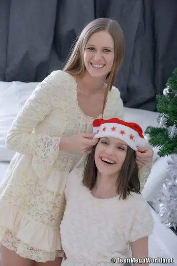 Neona – Two Petite European Brunettes Share Anal Threesome in Christmas Caps