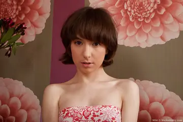 Short-Haired Brunette in Socks Spreads Her Hairy Pussy