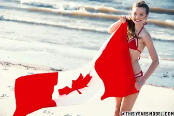 Michelle Jean – Thick Canadian Brunette in Pigtails Poses in a Bikini on the Beach