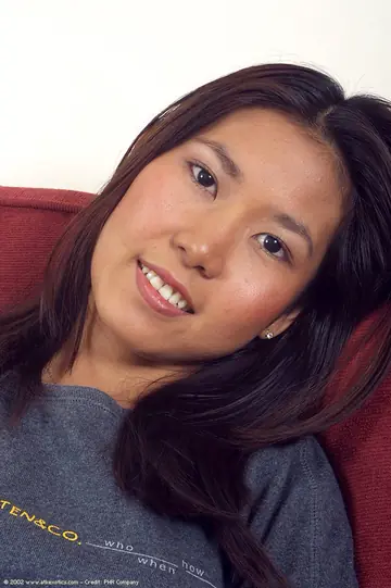 Asian Brunette Reveals Her Shaved Pussy Up Close