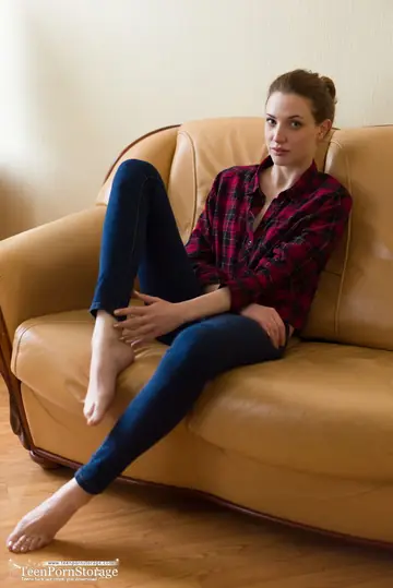 Skinny Pale Babe Pulls Jeans Aside to Finger Her Pussy