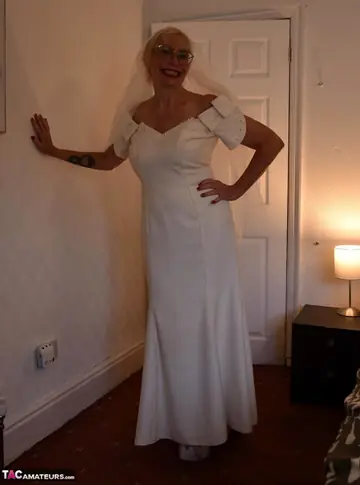 British MILF in Bridal Lingerie and Glasses Shows Her Big Tits