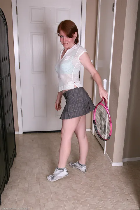 Thick Redhead MILF Strips Out of Her Tennis Skirt to Show Off Her Body – photo 3 of 21