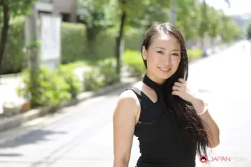 Aya Shiina – Japanese Brunette Flashes Her Legs in a Black Dress on a City Street