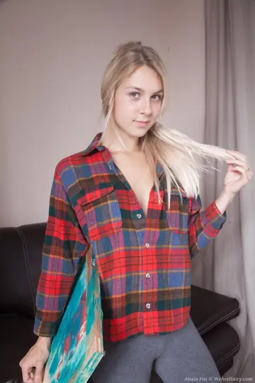 Slim Russian Blonde Shows Her Hairy Pussy and Fucks on the Sofa
