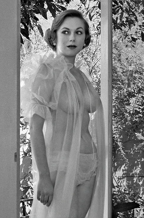 Jonnie Nicely: Redhead Posing Topless Outdoors in Black and White – photo 1 of 16