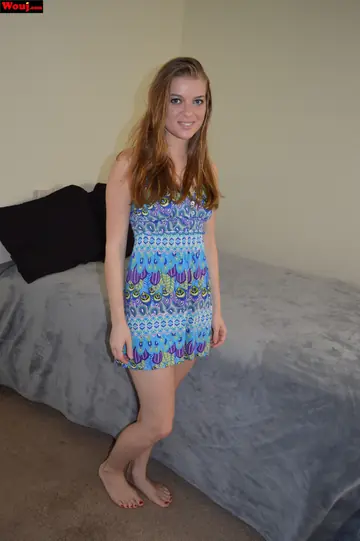 Woman Poses in Clothes and Pulls Her Top Down