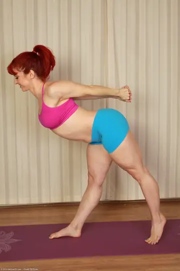 Andrea Rosu – Redhead MILF Strips Out of Her Shorts on Yoga Mat in the Gym