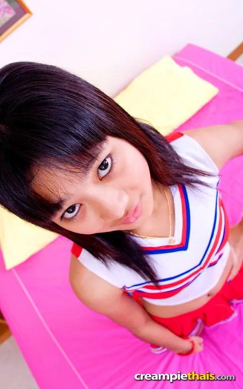 Thai Woman in Uniform Skirt Spreads Her Shaved Pussy – photo 4 of 20