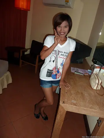 Nipa – Thai Brunette Strips Out of Her Shorts and Panties in the Bathroom