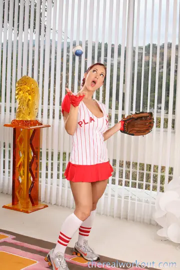 Kylee Strutt – Redhead with Big Tits Grips a Baseball Bat Nude