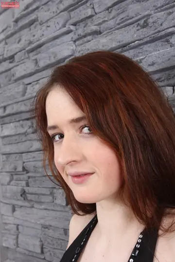 Maria Beaumont – Busty Brunette with Natural Tits and Tattoo Strips Nude