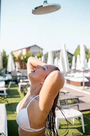 Emilly Starr – Blonde in a Bikini Poses by the Pool Wearing Glasses