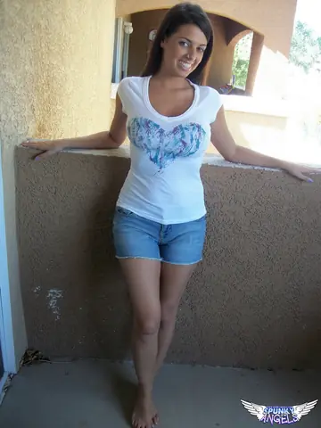 Brunette with Big Tits Pushes Down Her Shorts and Spreads
