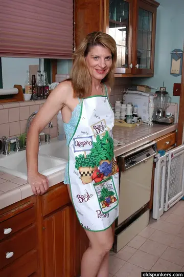 Mature Brunette Gets Fucked and Uses a Dildo in the Kitchen