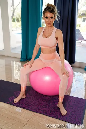 Busty Blonde MILF Poses in Yoga Pants at the Gym