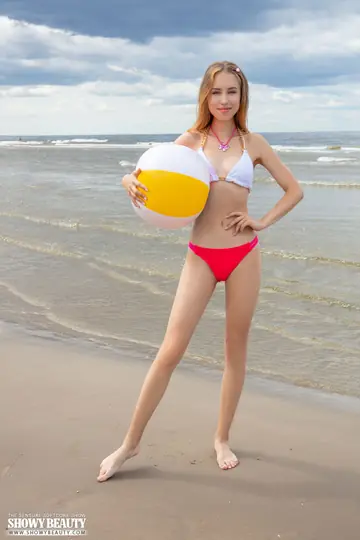 Woman in a Bikini Strips Nude and Spreads Her Pussy on the Beach