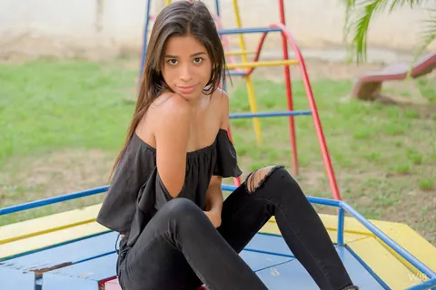 Karin Torres: Latina Brunette Sits on a Swing in Ripped Jeans – photo 13 of 16