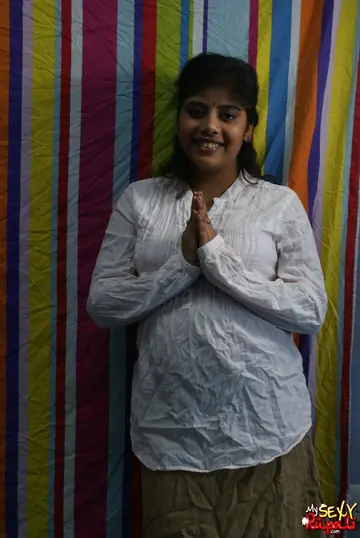 Indian Woman Strips Nude with a Smile