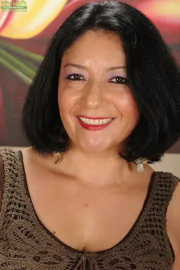 Isis Fajardo – Mature Brunette with Big Tits Spreads in Black Stockings