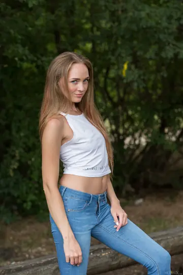 Slim Russian Brunette Strips Out of Her Jeans and Masturbates Outdoors