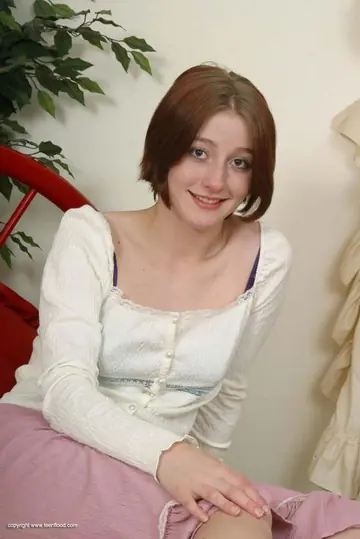 Redhead Strips Off Her Lingerie and Toys Her Shaved Pussy