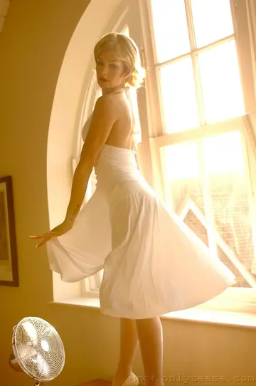 Slim British MILF Lifts Her White Dress to Show Stockings and Panties