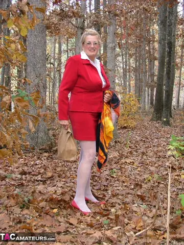 Woman in Stockings Masturbates with a Dildo in the Forest